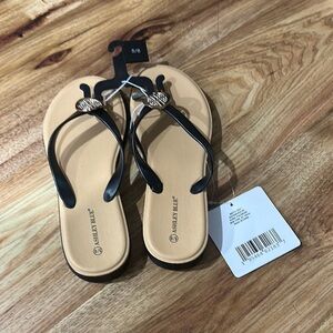 Women's Black and Tan Sandals